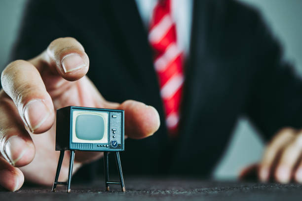 istock Television and businessman 871085944