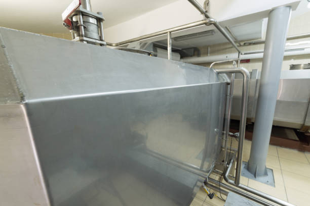 istock Storage of liquid with stainless steel tanks 871087046
