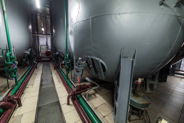 istock Steel semicircular gray tanks for fermenting the yeast mixture 871091116