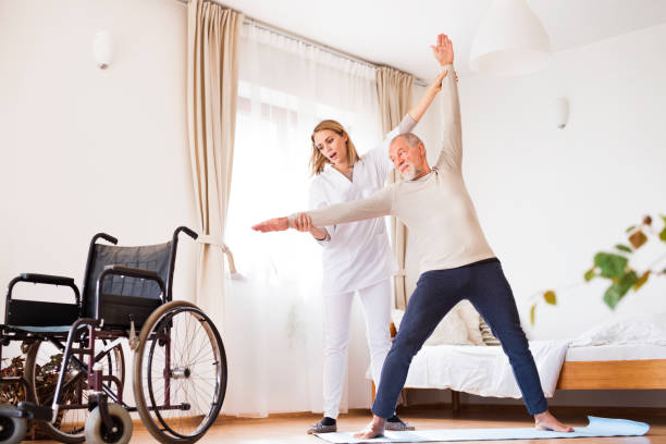 istock Health visitor and senior man during home visit. 871091758