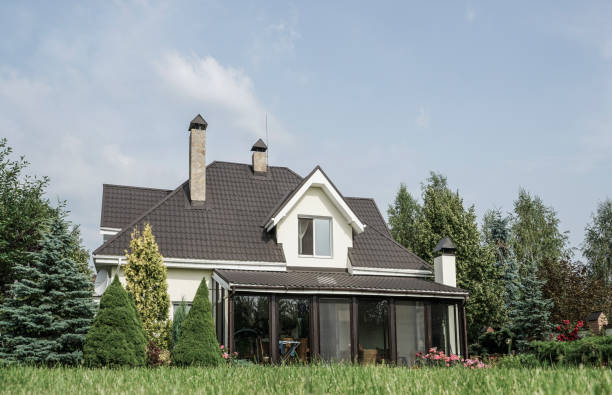 istock private house and its garden under beautiful sky 871094294