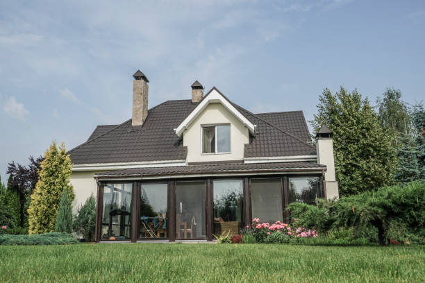 istock private house and its garden under beautiful sky 871094298
