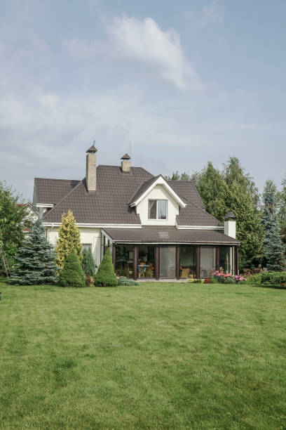 istock private house and its garden under beautiful sky 871094308