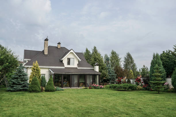 istock private house and its garden under beautiful sky 871094320