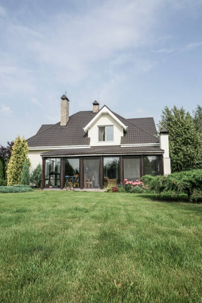 istock private house and its garden under beautiful sky 871094326
