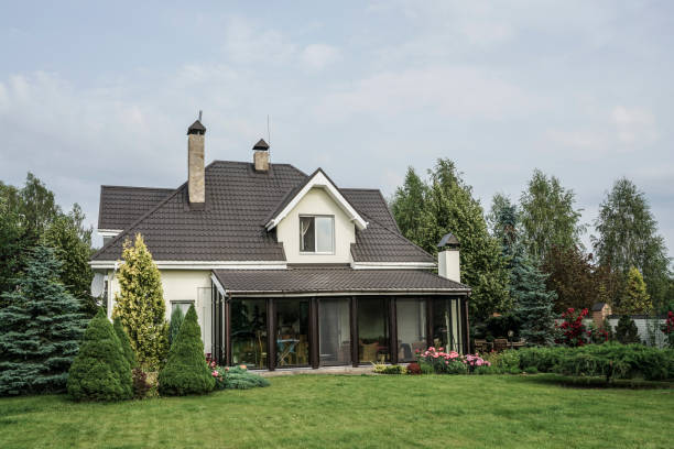 istock private house and its garden under beautiful sky 871094340
