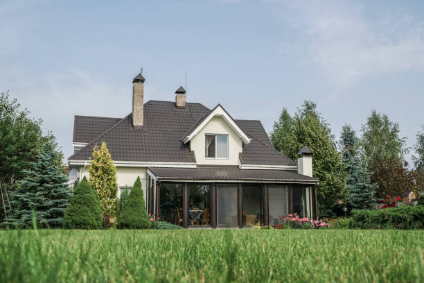 istock private house and its garden under beautiful sky 871094346