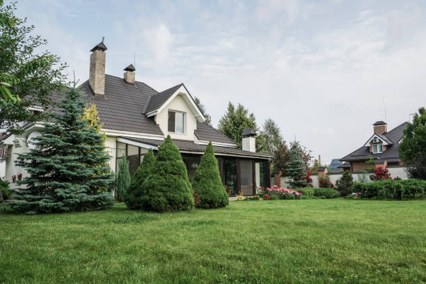 istock private house and its garden under beautiful sky 871094354
