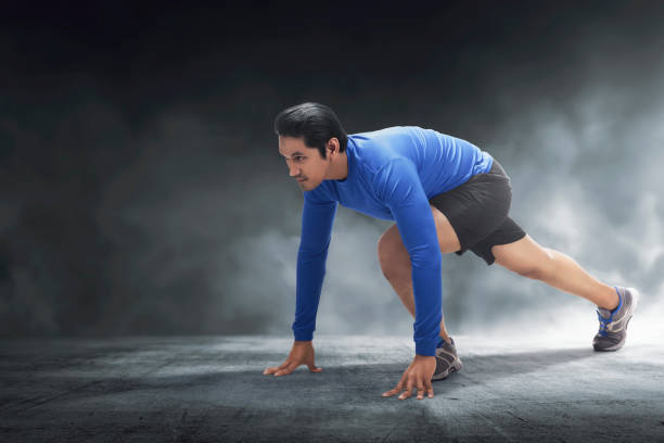 istock Muscular asian man ready for run 871094566