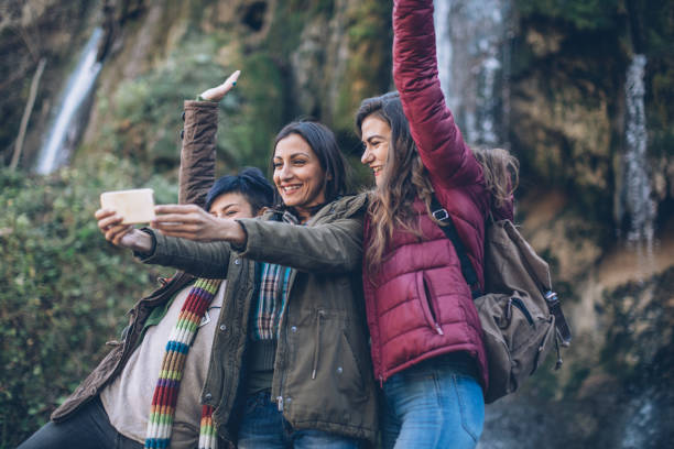 istock Young woman taking a selfie 871098880