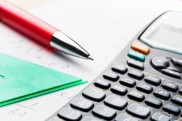 istock Close-up calculator with pen and set square 871102108