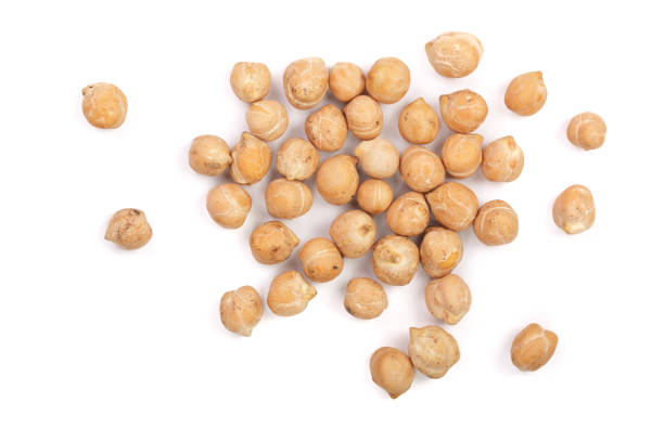 istock Dry raw organic chickpeas isolated on white background. Top view 871105072