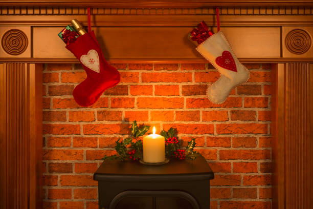 istock Christmas stockings hanging over the fireplace. 871119358