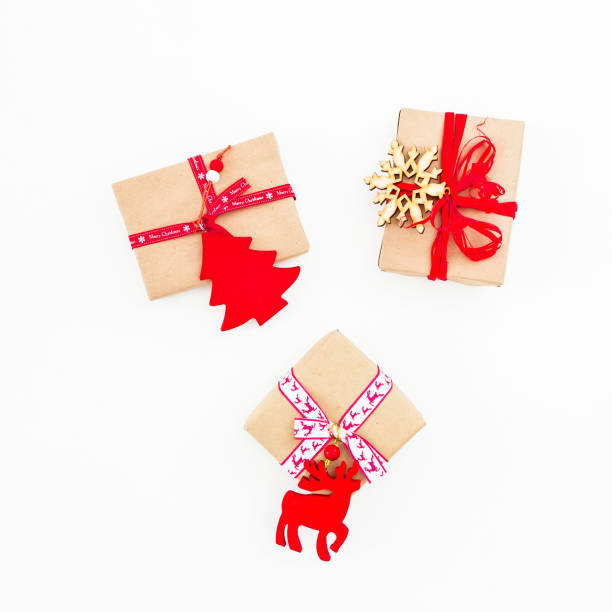 istock Christmas gifts box on white background. Flat lay, top view, copy space. New year concept 871130128
