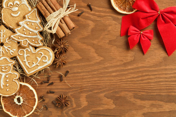 istock Christmas gingerbread on wooden background 871133312