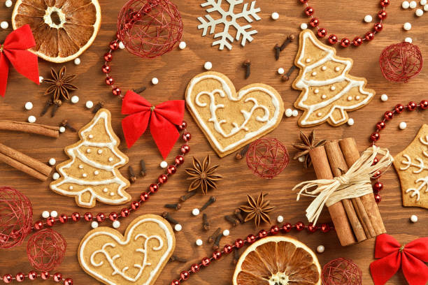 istock Christmas gingerbread on wooden background 871133418