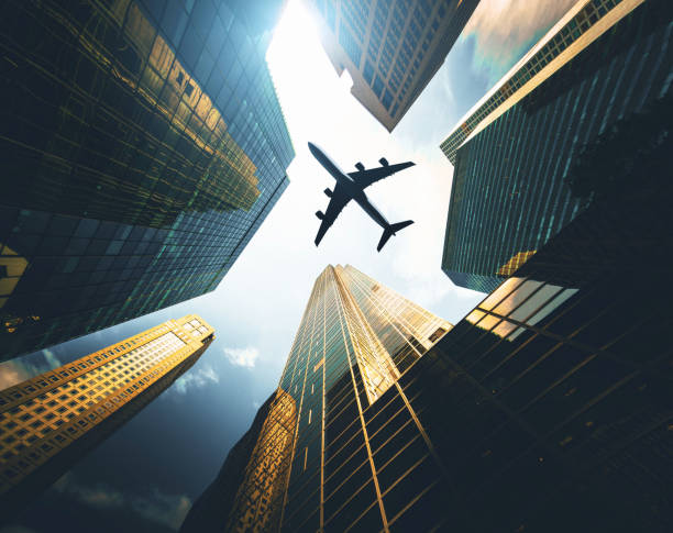 istock airplane flying in manhattan downtown 871134216