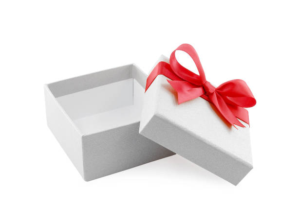 istock open and empty white gift box with red ribbon bow wrapped around the lid isolated on white background 871137748