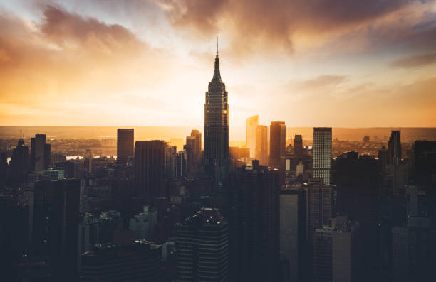 empire state building aerial view at dusk empire state building aerial view at dusk queens new york city stock pictures, royalty-free photos & images