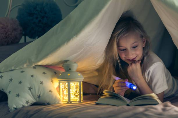 istock Girl enjoying a book 871140854