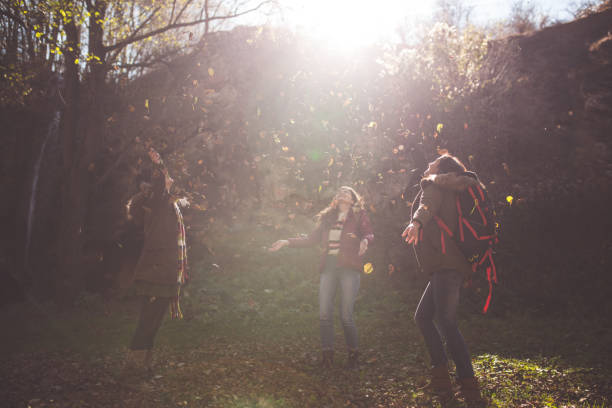 istock Childish Women Jumping In Forest 871140968