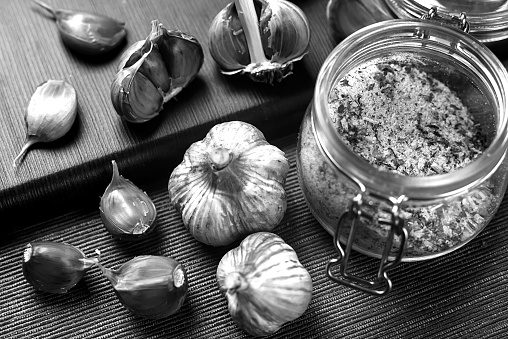 Garlic lying on the table black and white poster