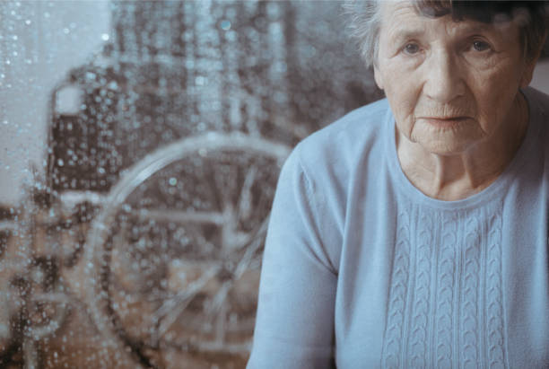 istock Elderly woman with osteoporosis 871141586