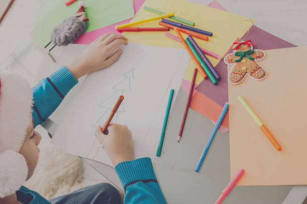 istock Child writing letter to santa, wait for christmas, top view 871142004
