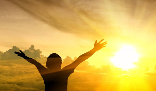 istock Men raise their arms up the sky 871142390