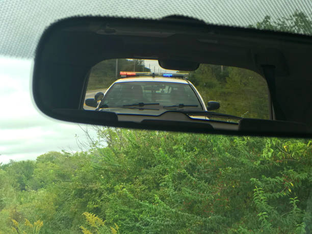 pulled over by police - speeding ticket imagens e fotografias de stock