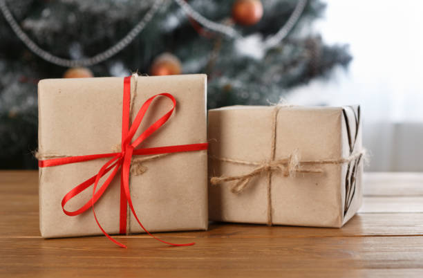 istock Christmas present on decorated room background, holiday concept 871149656
