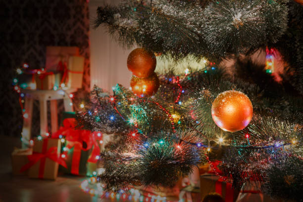 istock Beatiful christmas decorated tree in shining lights 871149876