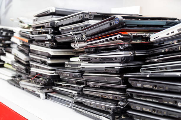 Stack of old, broken and obsolete laptop computer for repair Stack of old, broken and obsolete laptop pc computer for repair and recycle recycling computer electrical equipment obsolete stock pictures, royalty-free photos & images