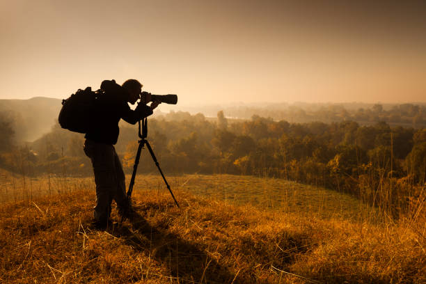 istock Man photographing nature 871152054