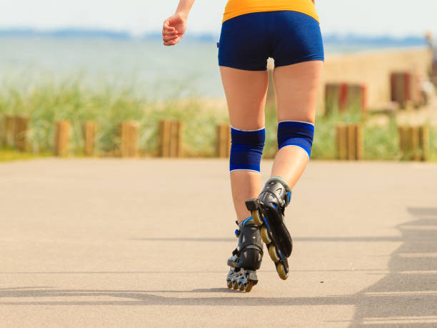 istock Young woman rollerblading outdoor on sunny day 871152068