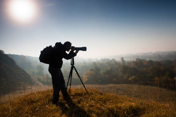 istock Man photographing nature 871152258