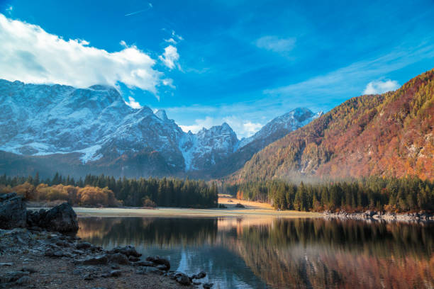 istock autumn sunrise at the alpine lake 871157654