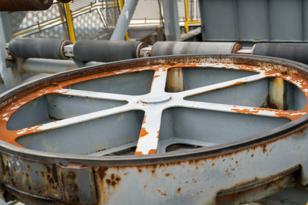 old rusty power wheel of an assembly belt