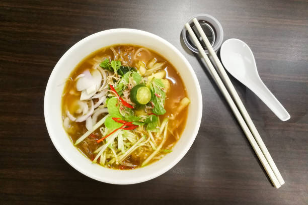 istock Penang Asam Laksa with prawn paste, popular Malaysian cuisine 871166910