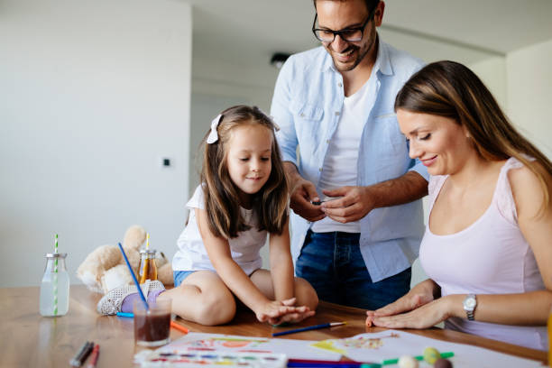istock Happy familiy spending fun time at home 871167952