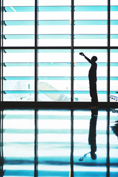istock Snapping a quick airport selfie 871169128
