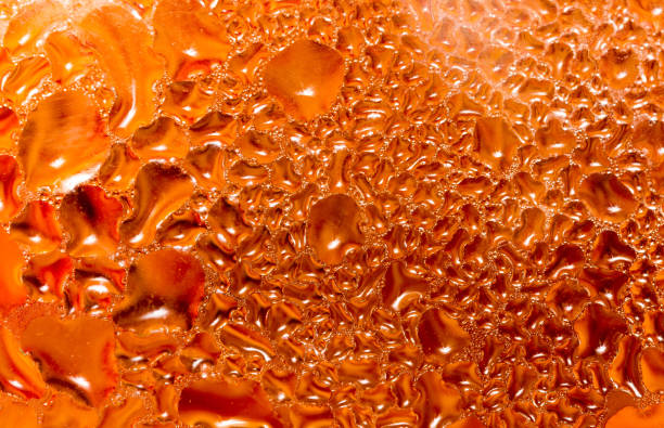 abstract background of drops on a red glass