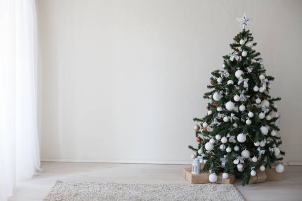istock Christmas tree with presents new year decor 871172342