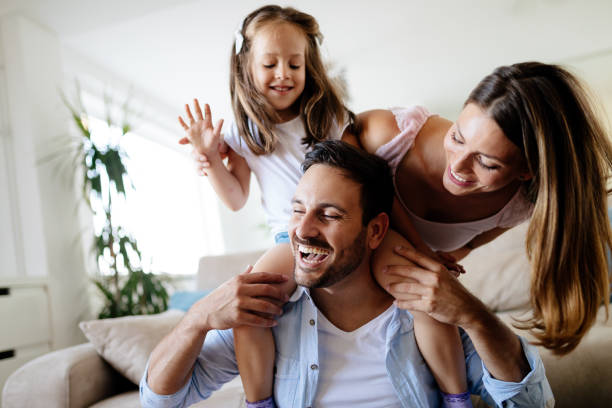 istock Happy family having fun times at home 871172386