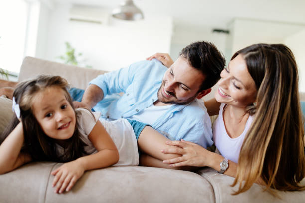 istock Happy family having fun times at home 871172638