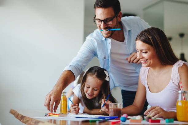 istock Happy familiy spending fun time at home 871173464