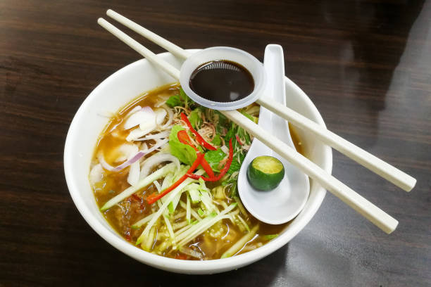 istock Penang Asam Laksa with prawn paste, popular Malaysian cuisine 871176120
