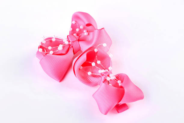 istock Pair of hair bows on white background. 871187236