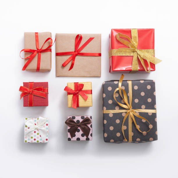 istock Gift boxes on white background top view. Wedding invitation, greeting card for Mother's Day. Beautiful birthday invitation. Selective focus. 871189668
