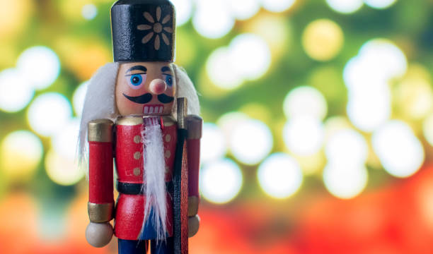 istock Christmas nutcracker toy soldier traditional figurine with bokeh background 871195910